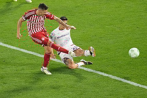 Stevan Jovetic is challenged by Lucas Martinez Quarta